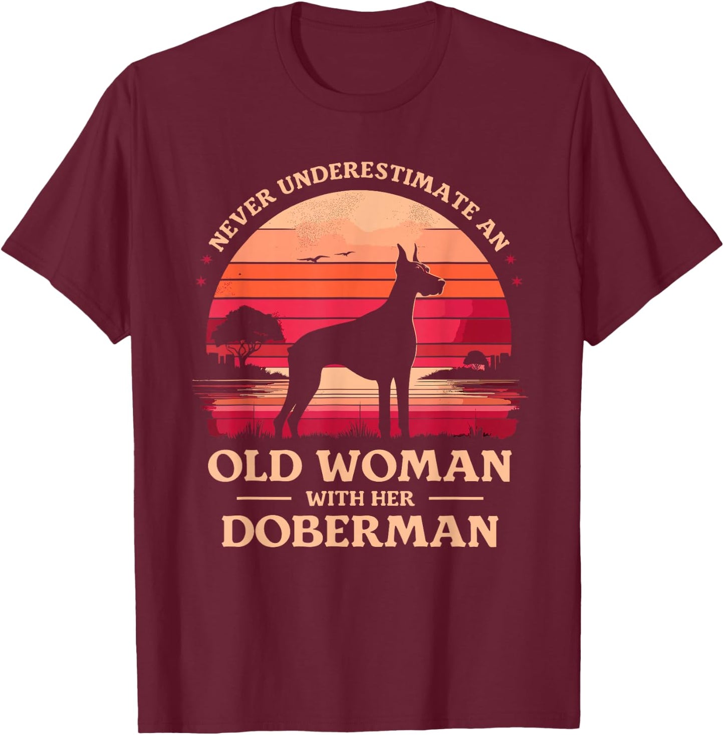 Never Underestimate An Old Woman With Her Doberman Dobie T-Shirt - T-Shirt | Maroon