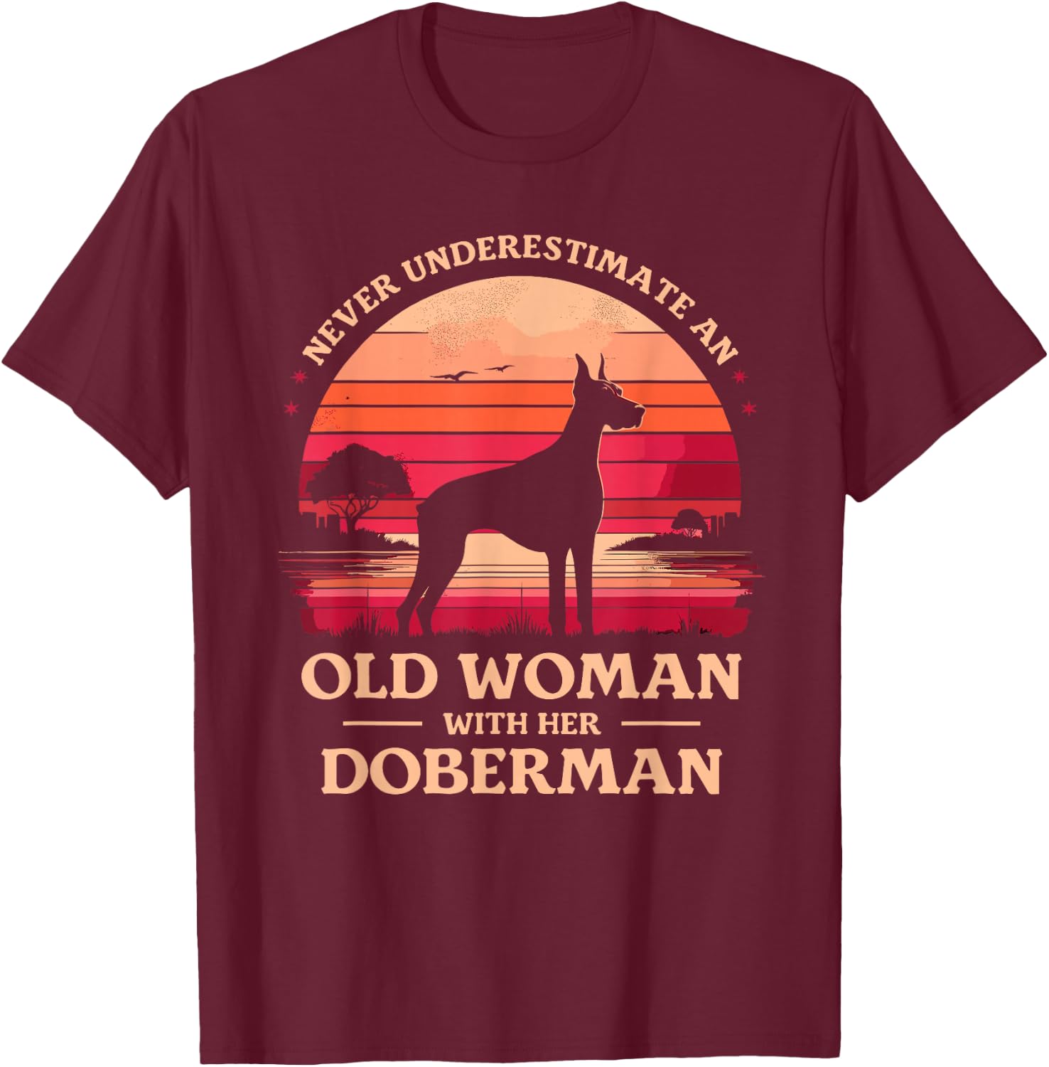 Never Underestimate An Old Woman With Her Doberman Dobie T-Shirt - T-Shirt | Maroon