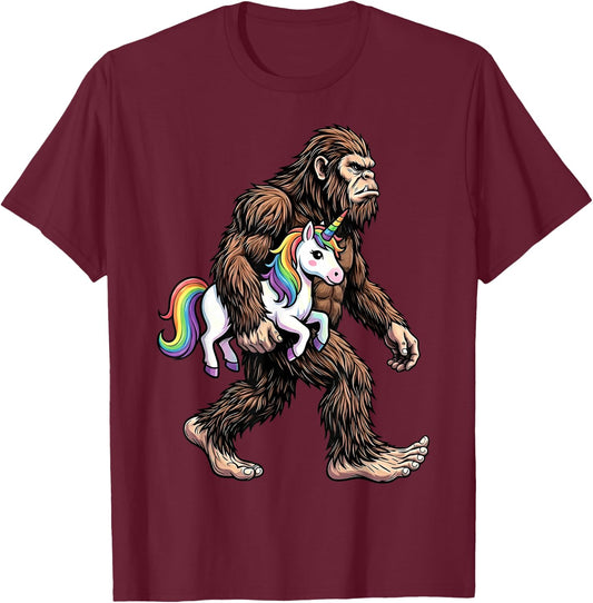Bigfoot Carrying Unicorn Funny Sasquatch Fantasy T-Shirt - T-Shirt | Maroon