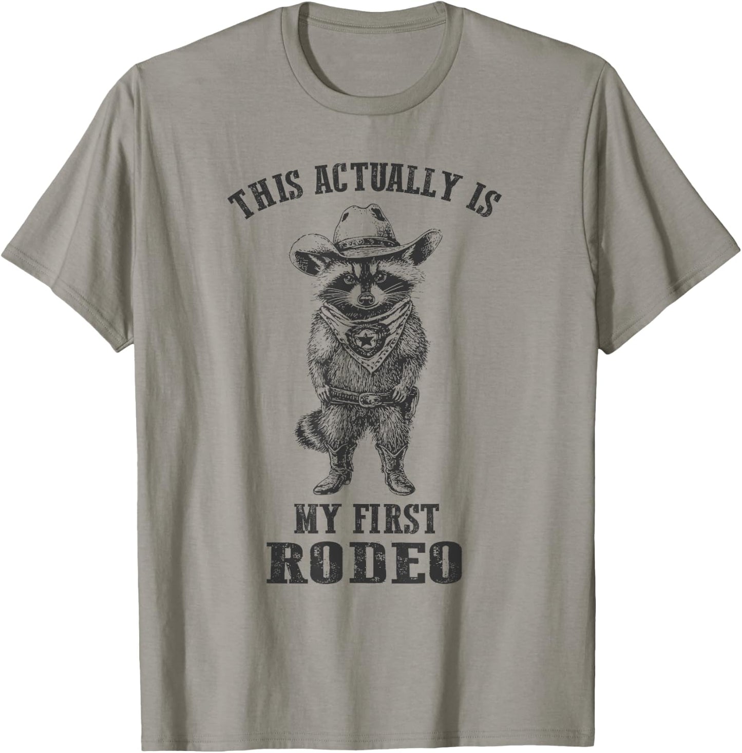 Vintage Cowboy Raccoon Shirt This Actually Is My First Rodeo T-Shirt - T-Shirt | Sand