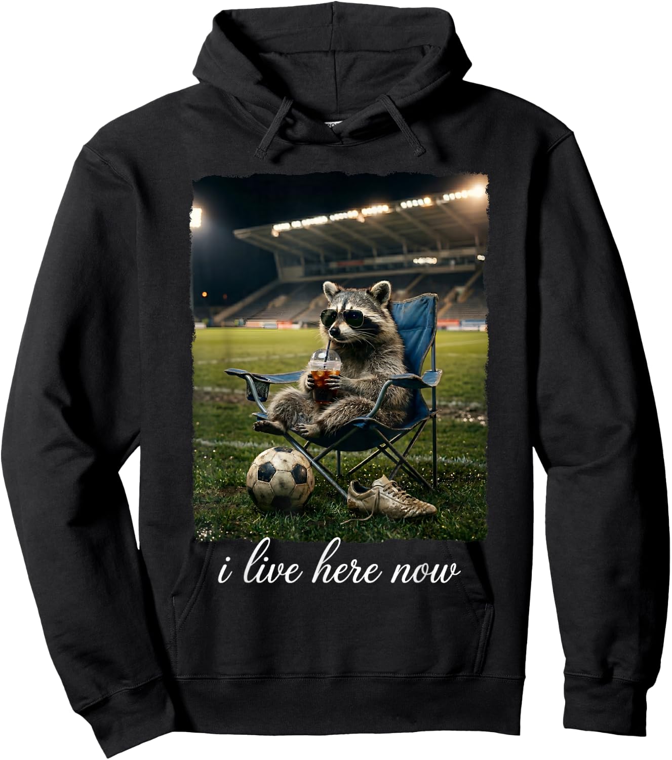 I Live Here Now Soccer Funny Raccoon Iced Coffee Hoodie - Hoodie | Black