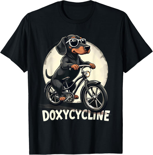 Doxycycline Pharmacy Funny Dachshund On Bicycle Pharmacist T-Shirt - T-Shirt | Black